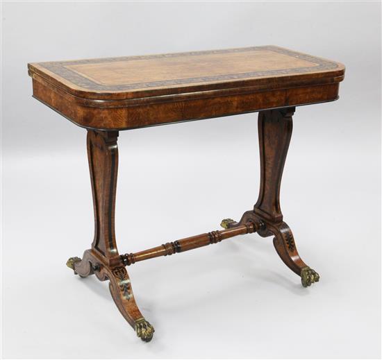 A Regency marquetry inlaid pollard oak card table, in the manner of George Bullock, W.3ft D.1ft 6in. H.2ft 6in.